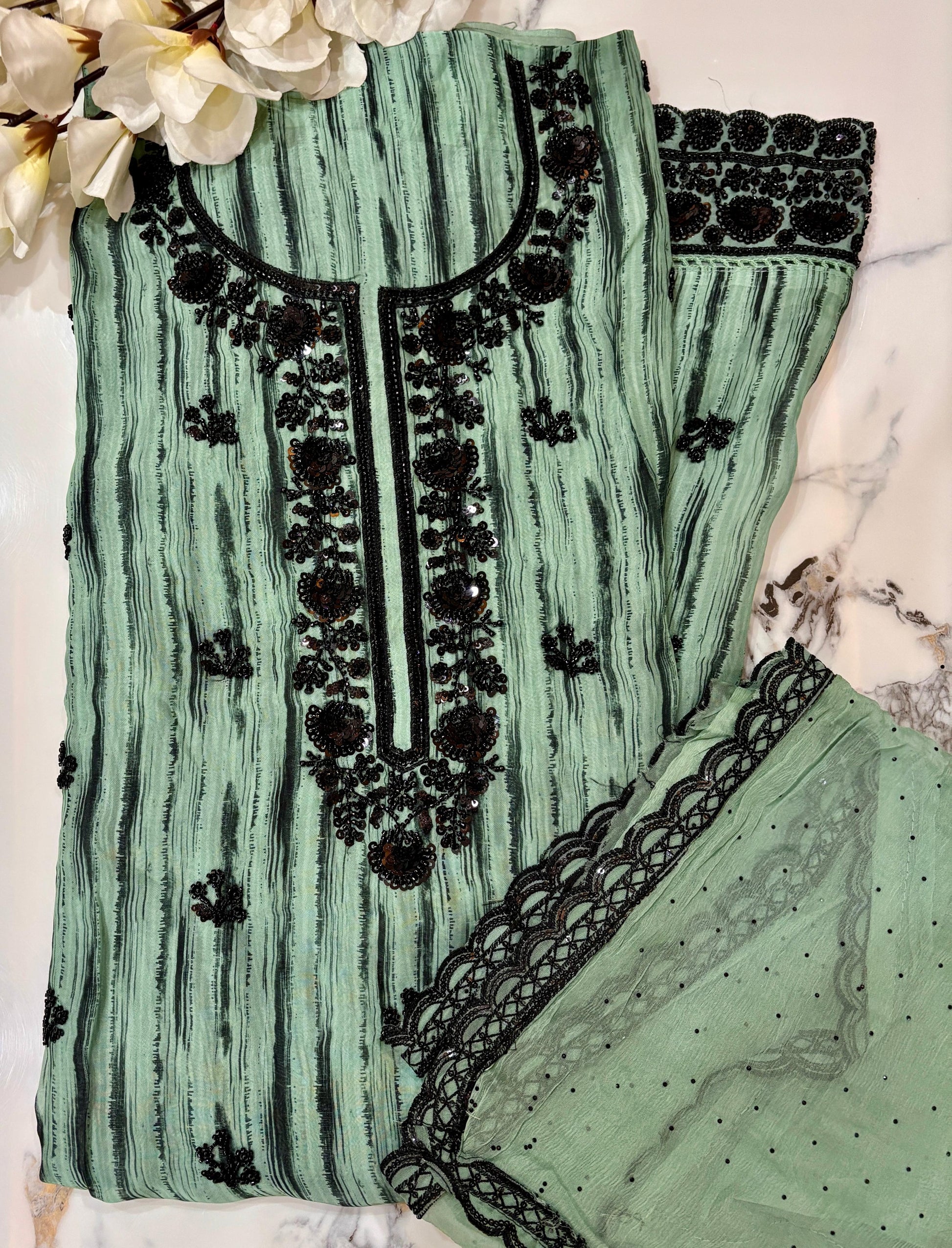 Unstitched Organza Embroidered English Green Suit.