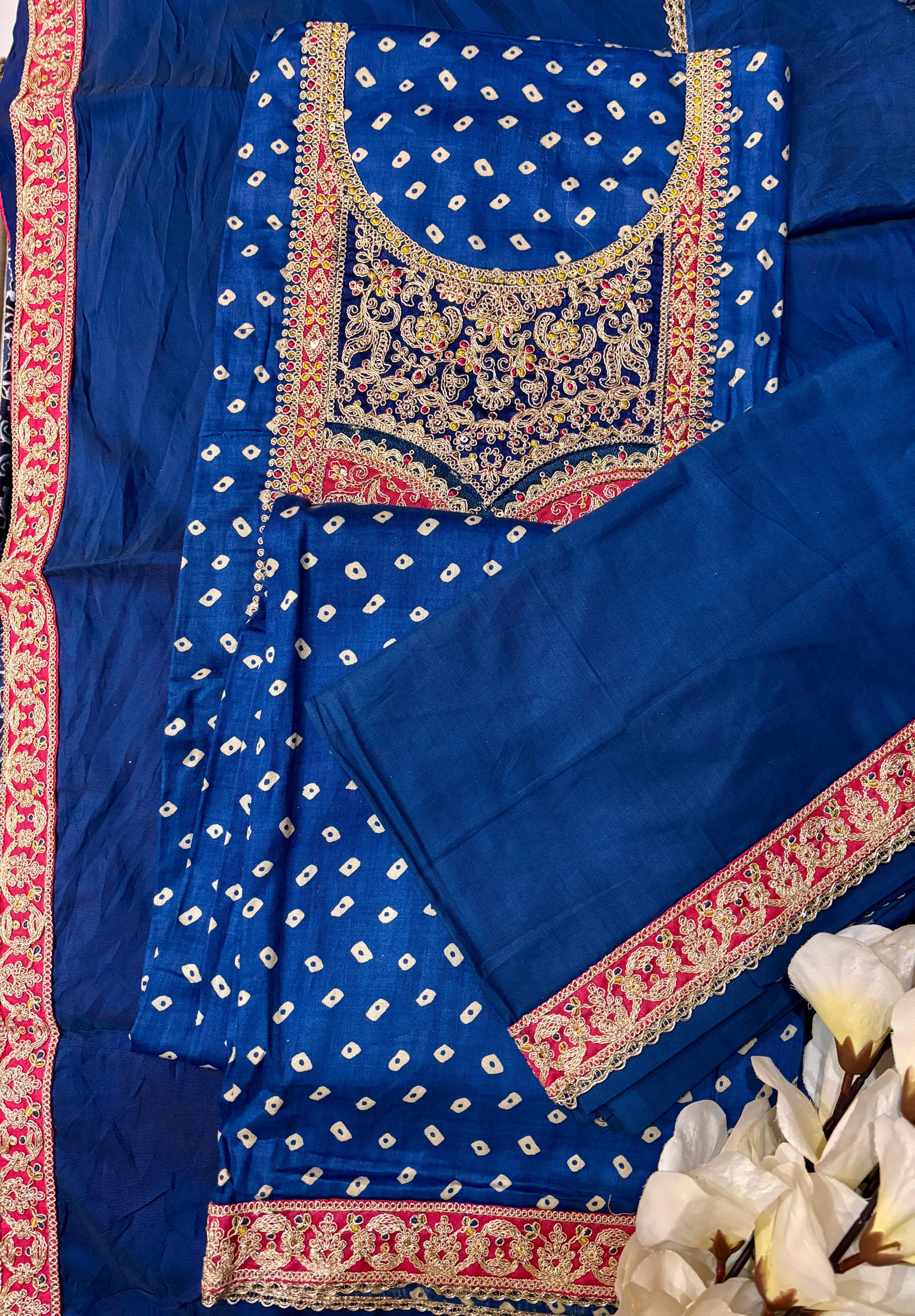 Unstitched Jaipuri Print Embroidered Suit.